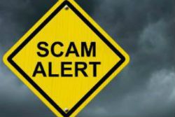 Garage door company scam alert street sign