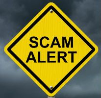 Garage door company scam alert street sign